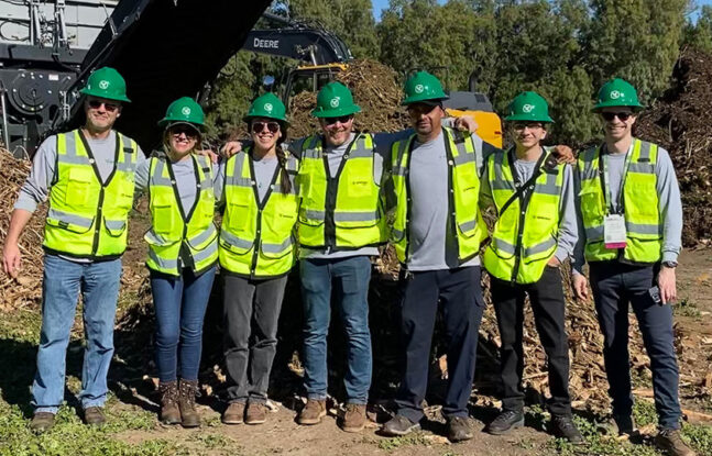 Seven Komptech Americas employees pose for picture at United States Compost Council demo day 2023.