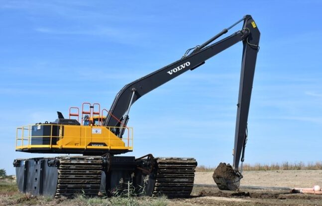 Volvo long-reach excavator digging on Poplar Island in Maryland