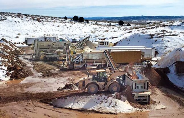 Power Equipment Company aggregate equipment working on a snowy jobsite at a Colorado plant