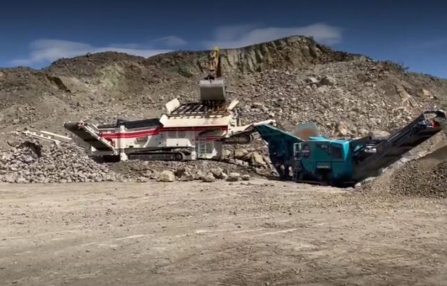 On-site material processing in Granby, Colorado. Equipment includs a Terex MDS M515 Track Trommel, Powerscreen Premiertrak 400 Jaw Crusher, and Powerscreen Warrior 2100 Screen Plant.