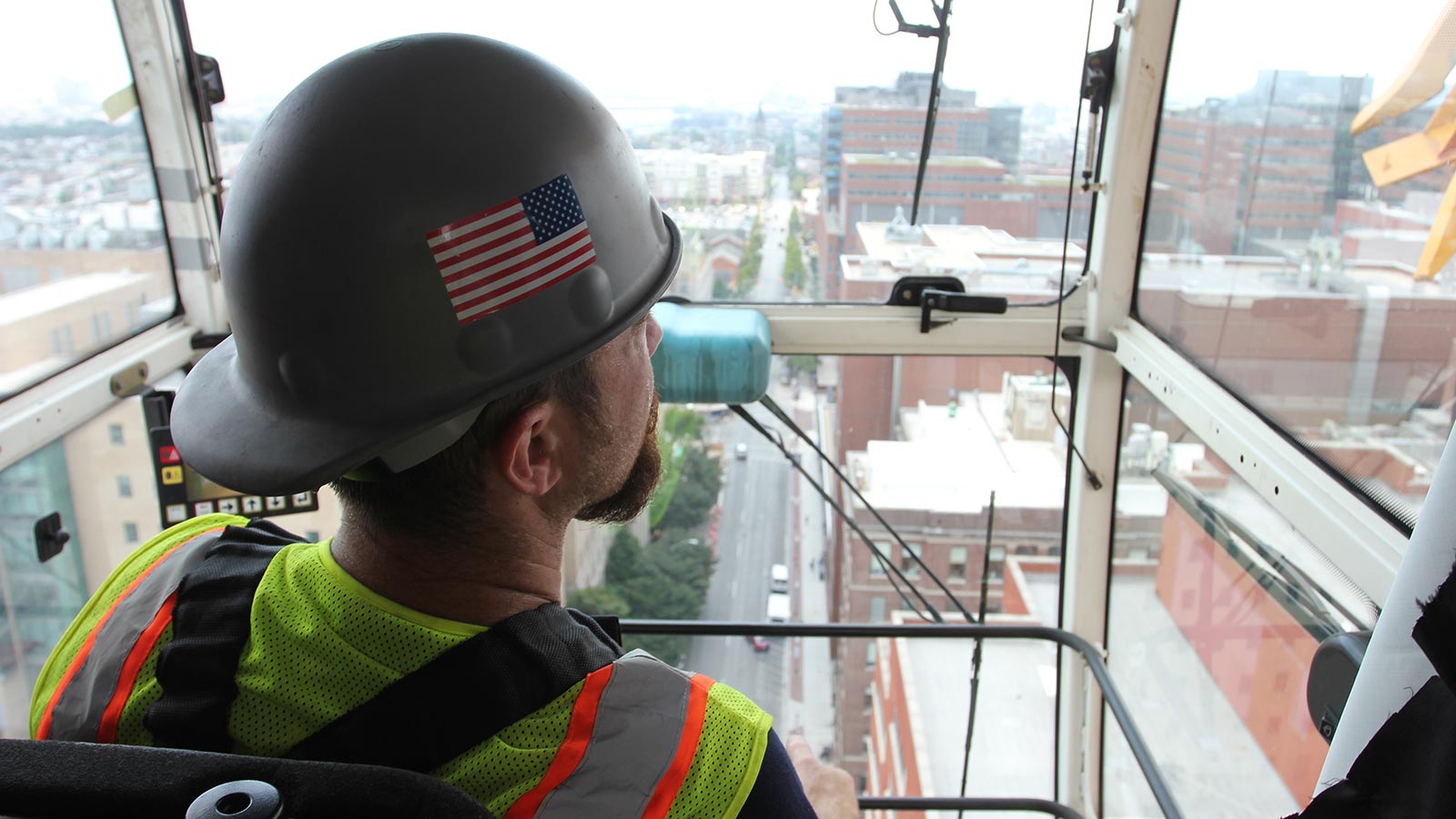 United Crane and Rigging tower crane operator overlooks buildings from high above